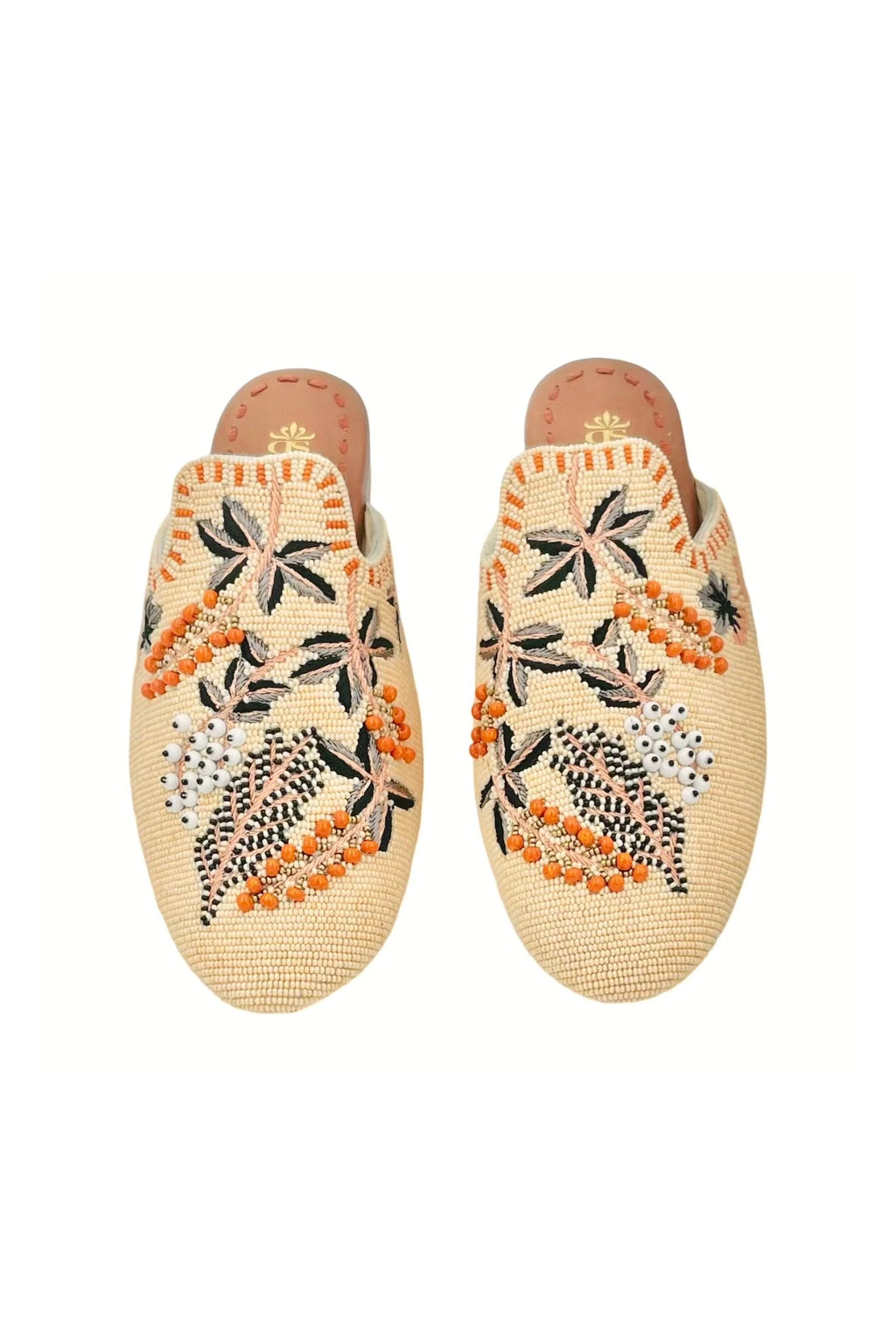 Meadow Beaded Slippers with Flower Pattern - Cream, by De Siena

Hello Summer! Enjoy these comfy cream multicolour flower beaded slippers in the city or during a stroll at the beach. A unique piece of handcrafted art.

upper: glass beads with lining in leather
sole: leather
insole: leather with logo
hand crafted