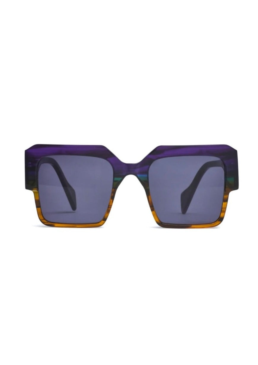 Stage - Purple Opal, by Age Eyewear Description:  noun: the platform in a theatre where actors perform.  Like the opal itself, this purple frame is semi-transparent and showing many small points of shifting colour against a pale or dark ground. Grey Monochrome Lens