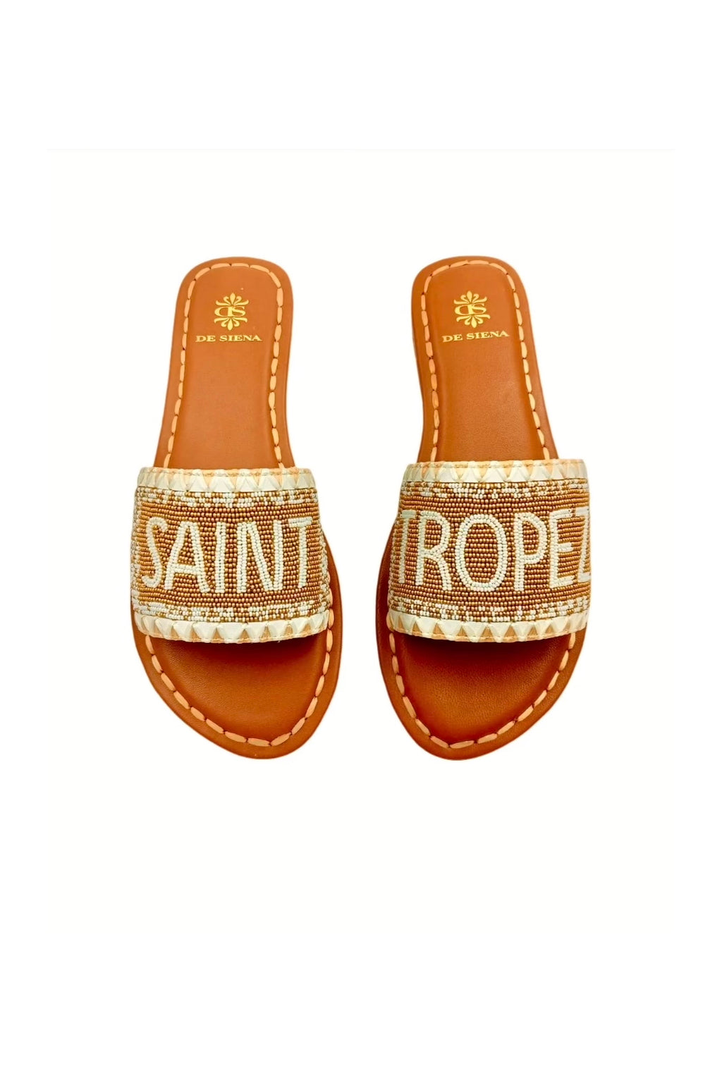 Saint Tropez Beaded Dégradé Resort Slides - Gold/Off White&nbsp;

Welcome to Saint Tropez. You'll catch us wearing these flat sandals during our vacation in Saint Tropez, heading to the beach for a sunset party. Hand crafted with dozens of little beads and embroidered sole, these flats in gold and off white are the best companions for a fun night out.