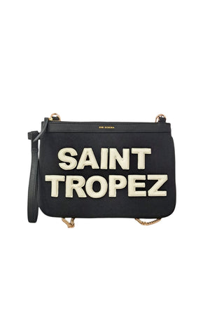 Saint Tropez Canvas/Leather Pouchette - Black/Off White, by De Siena

Welcome to Saint Tropez. You'll catch us wearing this pouchette during our vacation in Saint Tropez, heading to the beach or for a stroll through town. Hand crafted with canvas and letters in leather, this trendy pouch in black and white is the best companion for a fun day. Combine with our matching fussbett slides.

canvas with leather
gold chain as shoulder strap
size 187 x 25cms