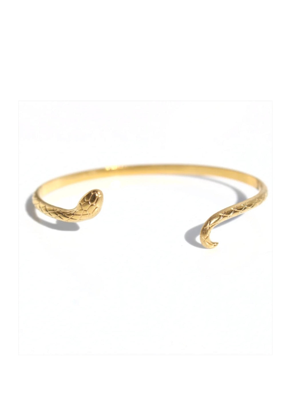 Petite Snake Cuff - Gold, by Queen of the Foxes Subtle statement jewellery...our Petite Snake Cuff is elegant, classic and perfect with your summer tan and current bracelet stacks!  DETAILS:  Adjustable  5.5cm diameter   Stainless with Gold Plate