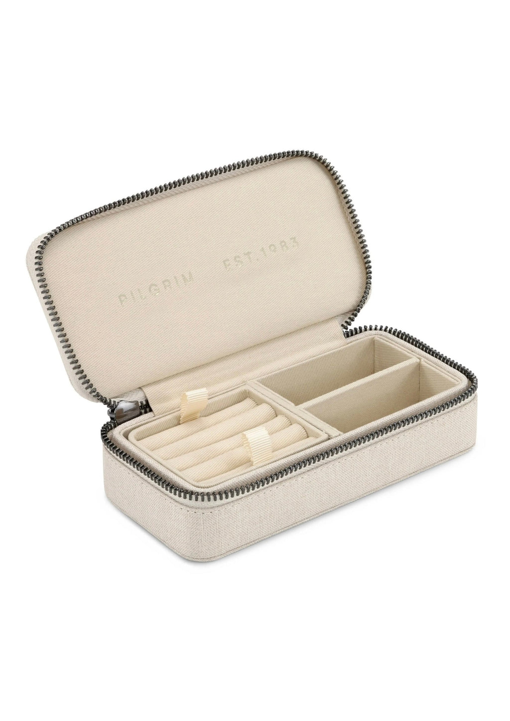 <h3>Pilgrim Jewellery Box - Light Sand</h3> <ul class="product-selling-points__list" data-mce-fragment="1"> <li class="product-selling-points__item" data-mce-fragment="1">Compact jewellery box</li> <li class="product-selling-points__item" data-mce-fragment="1">100% cotton in the colour Light Sand</li> <li class="product-selling-points__item" data-mce-fragment="1">Measures 17 x 8 x 4.5 cm</li> <li class="product-selling-points__item" Perfect storage of your jewellery or for travel