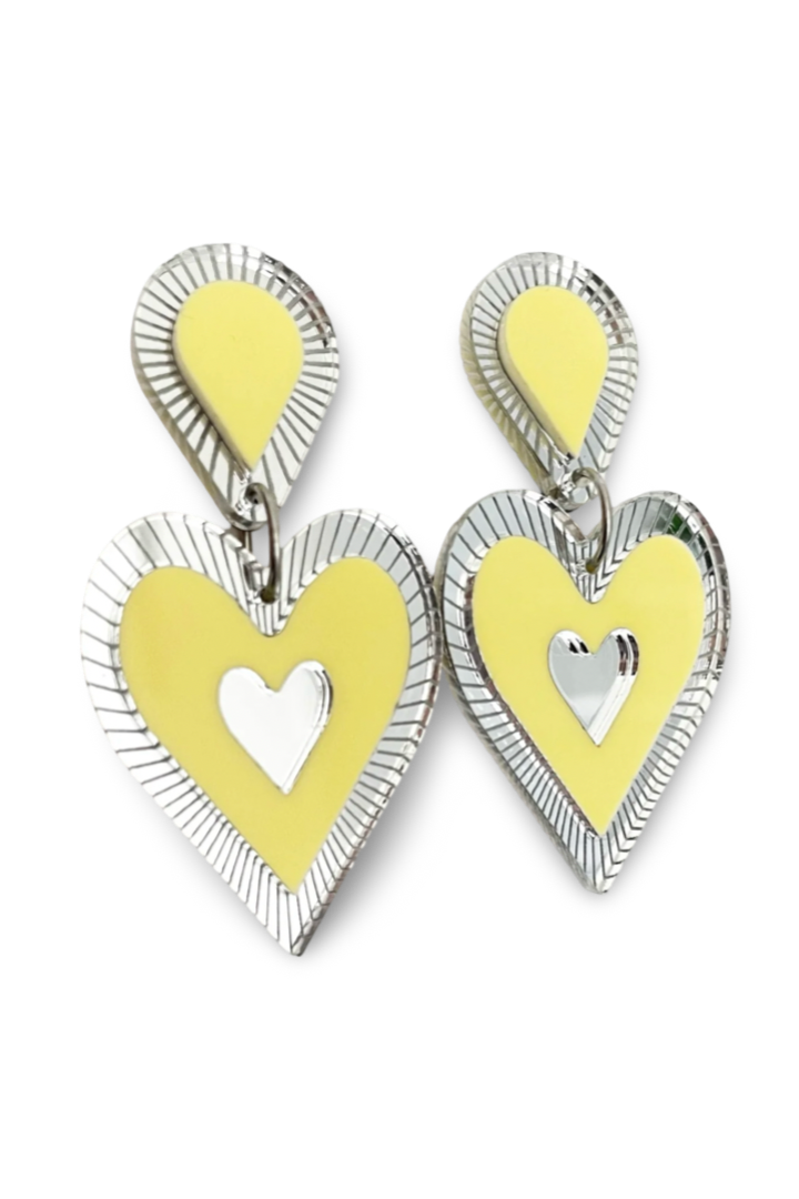 Freina Single Drop Earrings - Lemon Sorbet, by Lover Lover

Freina - A beautiful Heart shaped single drop earring with elegant movement in the ear. Some would say of a flirtatious nature as it is hard to take your eyes off her.&nbsp;