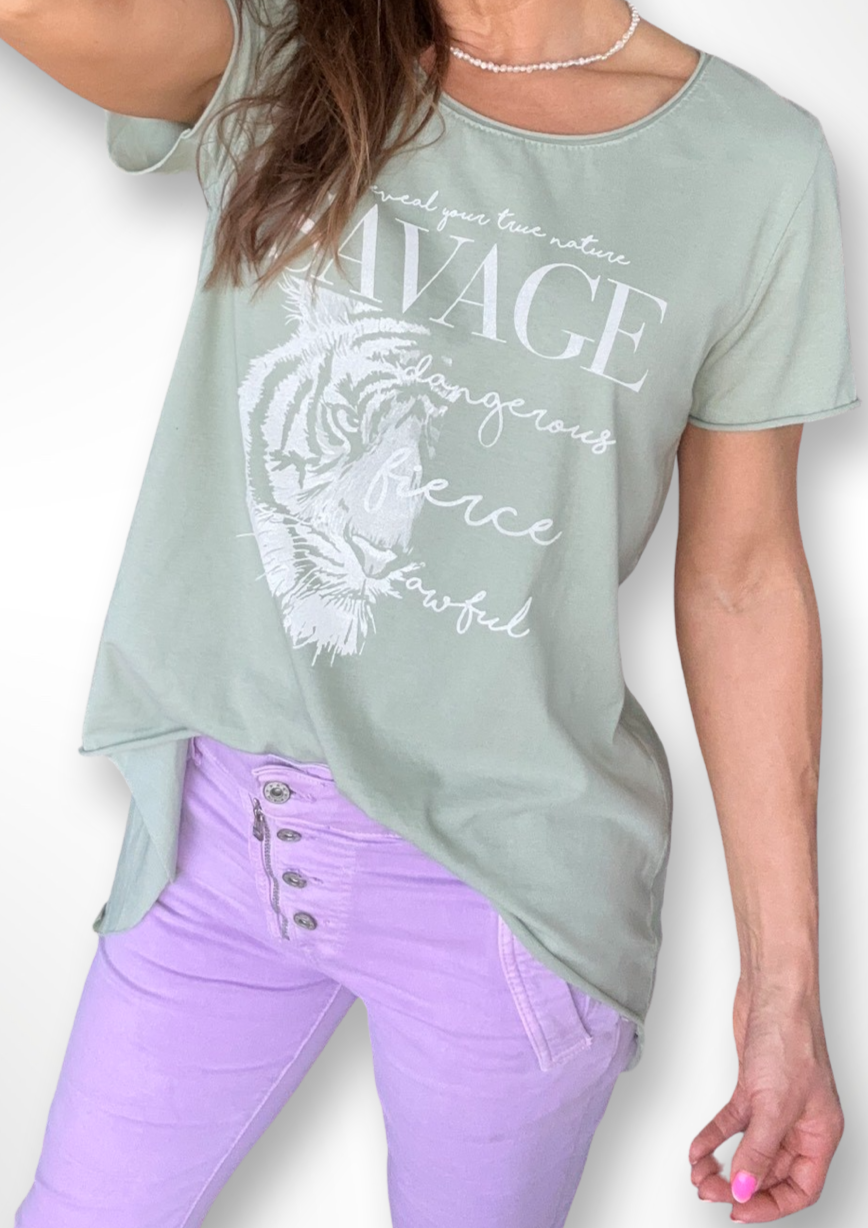 Fierce Hi Lo Tee - Mint, by Amici Elevate your casual wardrobe with the Fierce Hi Lo Tee.  This lightweight tee is made from 100% cotton and features fierce design, and hi lo hem, making it the perfect weekend tee with denims or our fab Wisteria Portofino Jean!
