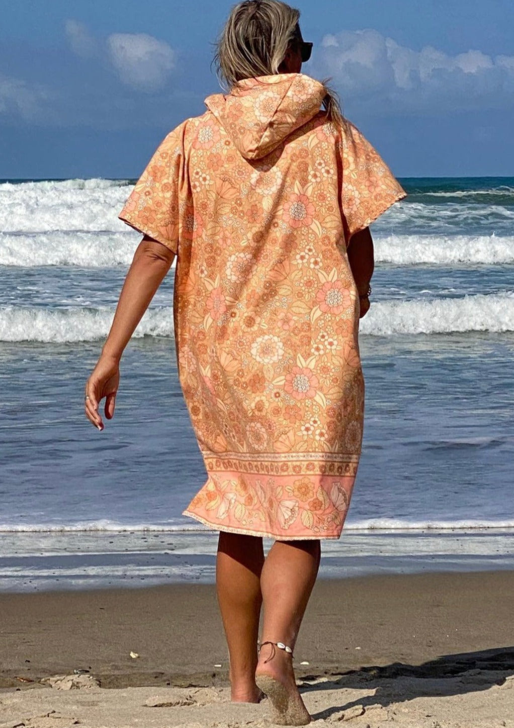 Eco Surf Poncho, Adults - Pink Peony - Pink Peony, by Flock These stunning and soft surf ponchos are made from 85% post-consumer plastic bottles. Recycled plastic bottles are transformed into polyester fabric to be used to create these amazing ponchos. It takes up to 14 plastic bottles to make one poncho, ultimately preventing these plastic bottles from ending up in landfills or our oceans.