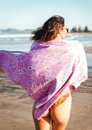 Flock Eco Beach Towel - Fuschia Floral These stunning and soft beach towels are made from 85% post-consumer plastic bottles. Recycled plastic bottles are transformed into polyester fabric to be used to create these amazing towels. It takes up to 14 plastic bottles to make one towel, ultimately preventing these plastic bottles from ending up in landfills or our oceans.