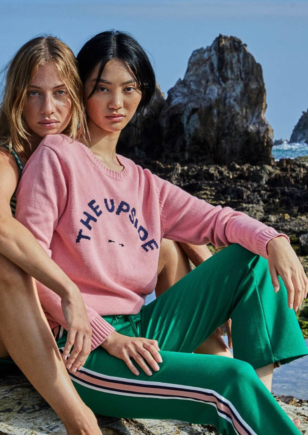 Biarritz Bondi Knit - Flamingo Pink, by The Upside Think pink in our Biarritz Knit Bondi Sweater  Knitted Flamingo Pink crew in our classic Bondi silhouette. The Upside horseshoe logo knitted at centre front in contrast Navy. Combed cotton for chic comfort.