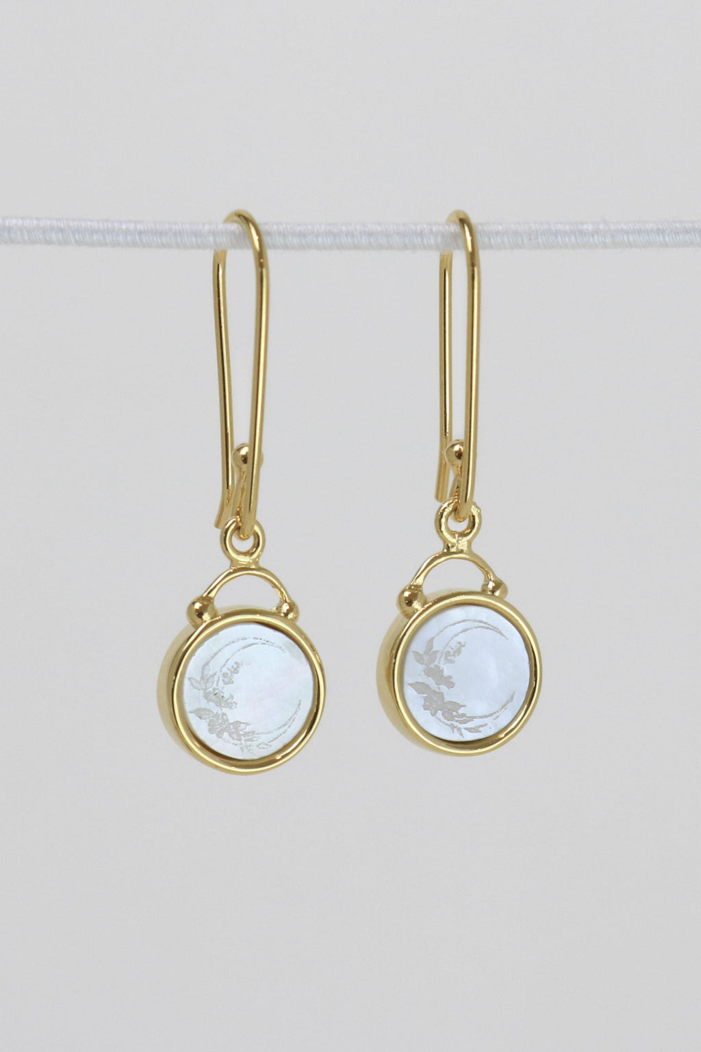 Spirit Earrings in Gold, by Love Lunamei

Soul Searcher Collection – The quest to live a life with purpose

She is not afraid to dive into the deepest corners of her conscience to evaluate her life, her values and her emotions. For once she has reflected with honesty she can reconnect with and replenish her soul. She lives a life full of meaning, pure happiness and unlimited potential.