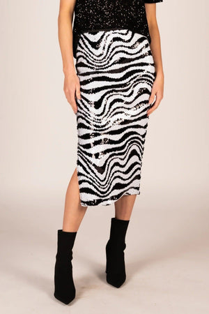 Sara Sequin Pencil Skirt - Zebra, by We Are The Others  Elevate your evening look by pairing the new Sara Pencil Skirt in sequin black and white zebra print with a sleek silk cami and heels for a chic, sophisticated ensemble or with a t-shirt and sneakers for a relaxed, fun vibe.