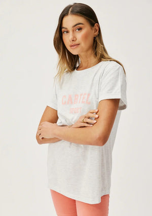 Marlo Tee - Grey Marle/Guava, by Cartel & Willow Details:  Relaxed fit t-shirt Short sleeve Curved hemline Large Cartel sport logo on the chest in guava print 100% cotton jersey marle fabric Eden wears a size small and is 175cm tall