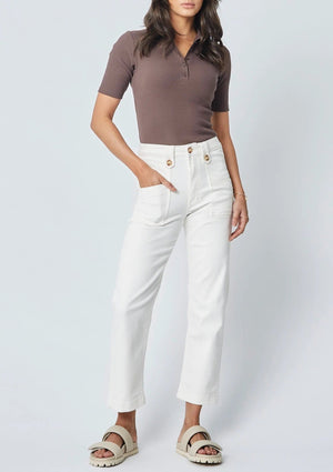 Stella High Waisted Stretch Trouser - Ivory, by Dricoper Stella is designed keeping the ’70s in mind. Made with comfortable stretch denim for a flattering high-rise fit in a wide-leg shape. Squared patch pockets, horn button on waist closure and belt loops. Garment-washed for extra softness and comfort.