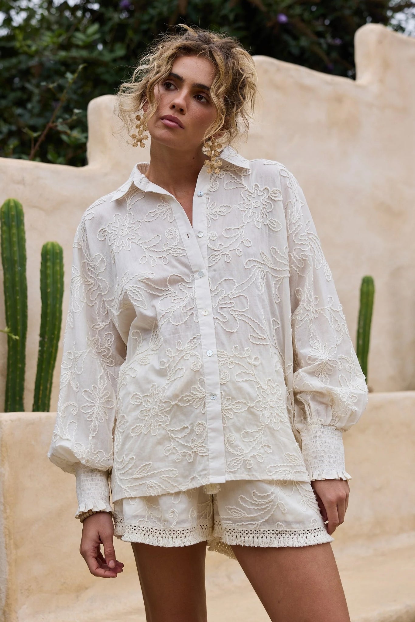 Chantilly Shirt - Natural Embroidery, by Talisman
Button up front

Oversized fit

Exaggerated grown on sleeves

Shirred cuffs

High low hem

Beautiful embroidered seersucker fabrication