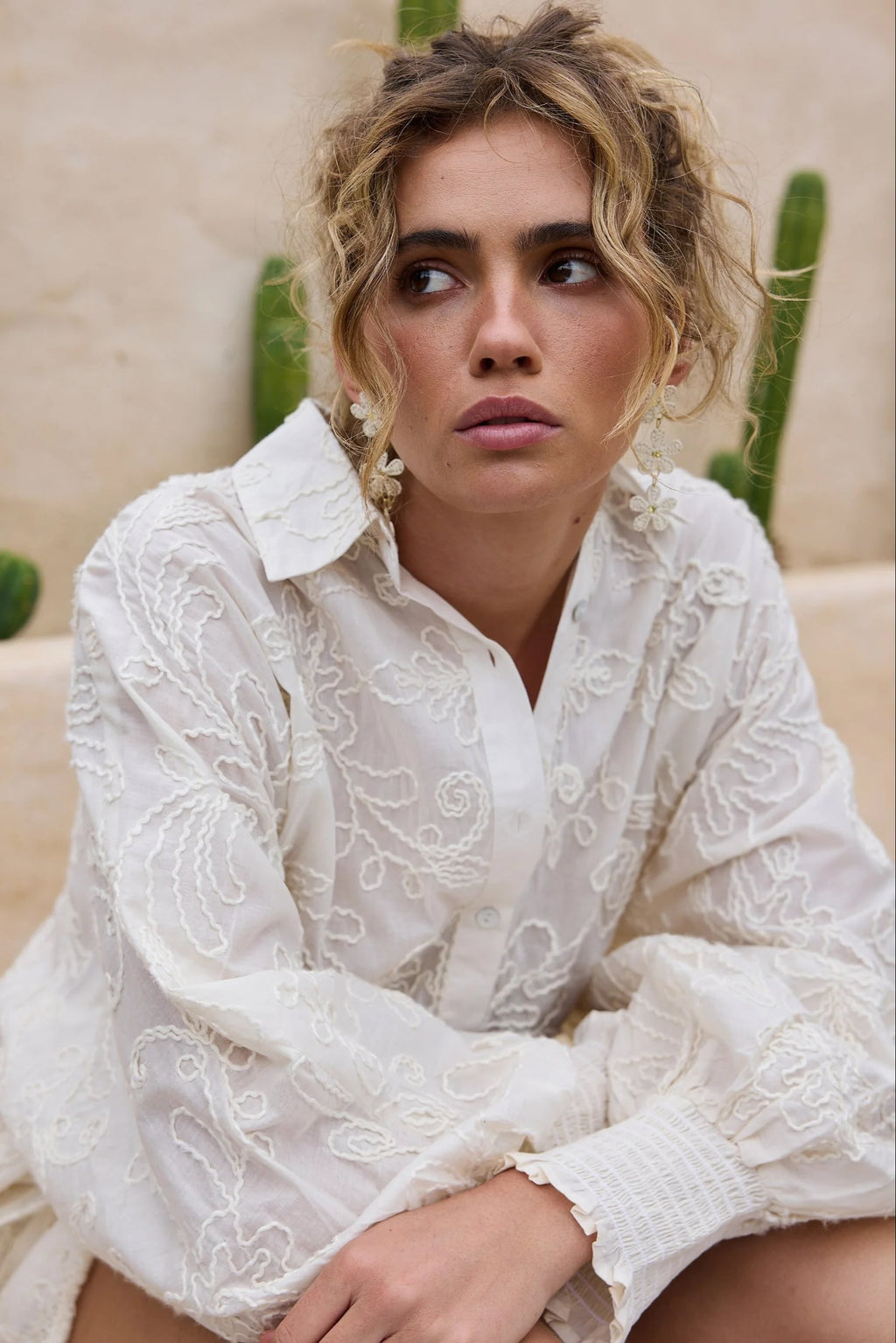 Chantilly Shirt - Natural Embroidery, by Talisman
Button up front

Oversized fit

Exaggerated grown on sleeves

Shirred cuffs

High low hem

Beautiful embroidered seersucker fabrication