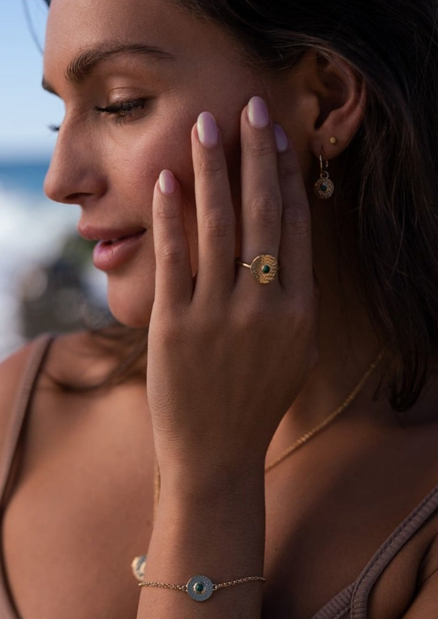 Zarina Ring in Gold | Love Lunamei         Stack It                New  Chara Collection - You are Guided and Protected  All around us there is order and chaos, harmony and disharmony, clarity and confusion. With it's vibrant green hue, Malachite has been used for centuries as a protective gem and a stone of transformation. 