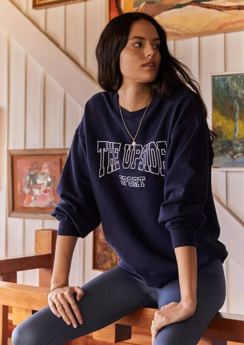 Ivy League Saturn Crew - Navy, by The Upside Join the athletic club in your Ivy League Newport Crew.  Relaxed and oversized crew. Soft rib neck cuffs and waist Embroidered ivy league The Upside Sport logo at chest in white Made with Organic Cotton french terry in classic navy Please refer to studio images for accurate colour of garment