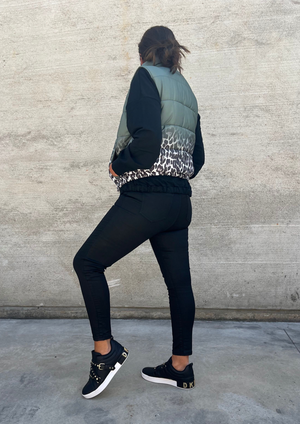 Lepore Puffer Vest - Olive Leopard, by Amici Stylish and cosy, the Italian Made Lepore Puffer Vest will be your go to this winter, for walks, sporting sidelines, and weekend brunches.  Also available in Black Leopard and Coffee Leopard