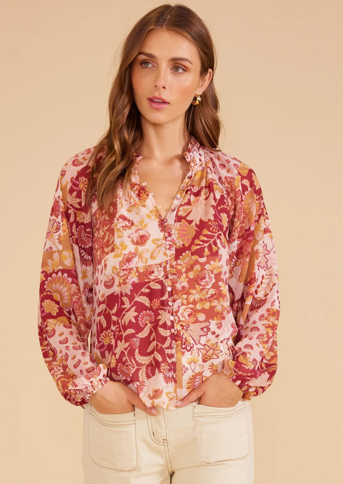 Rylee Blouse by MinkPink Details:  - All-over floral and paisley print button-through blouse - Relaxed fit - High neckline with ruched detail - Self-covered buttons with button loops down the centre front - Slightly sheer - Full-length raglan blouson sleeves with elasticised cuffs