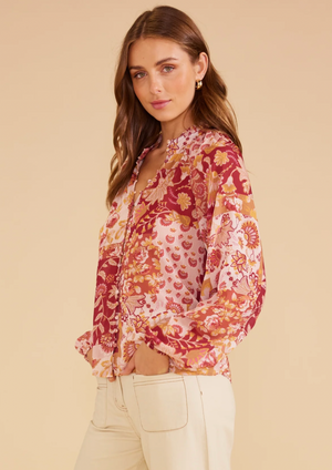 Rylee Blouse by MinkPink Details:  - All-over floral and paisley print button-through blouse - Relaxed fit - High neckline with ruched detail - Self-covered buttons with button loops down the centre front - Slightly sheer - Full-length raglan blouson sleeves with elasticised cuffs