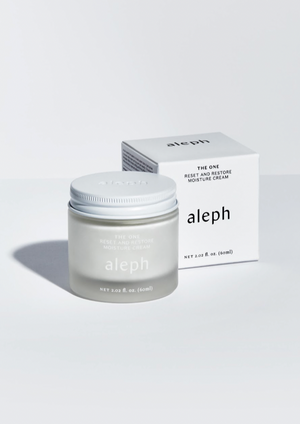 Aleph The One - Reset + Restore Moisture Cream 60 ml  A game-changing day to night moisturiser formulated with a potent stack of clinically-proven plant actives to provide visible instant and ongoing skin benefits. Its special blend of adaptogenic herbs, bio-actives and HA visibly lifts and firms the skin, softens the appearance of fine lines and wrinkles, while promoting brighter, healthier-looking skin.