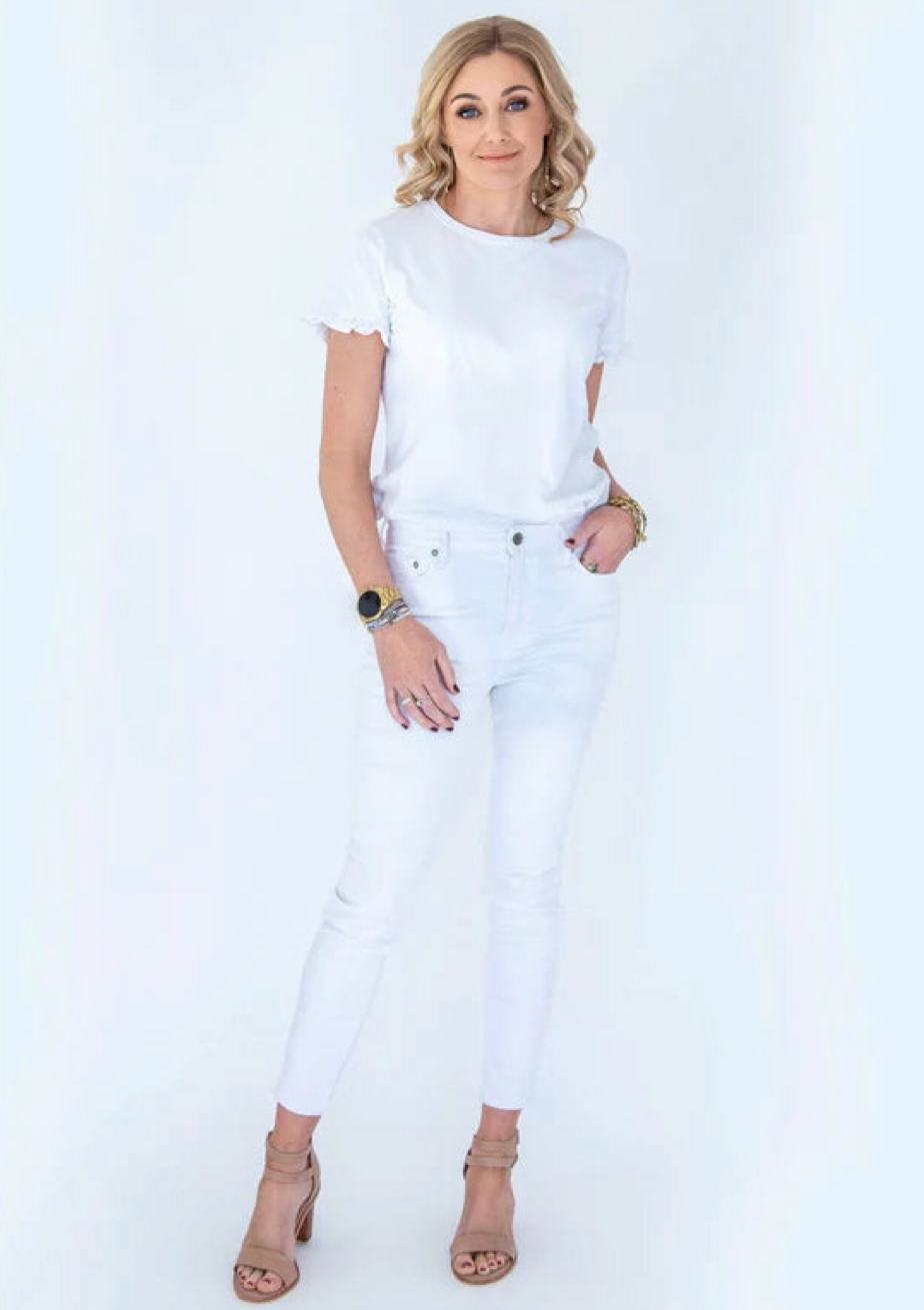 Cult of Individuality Chloe High Rise Jean - White Cult of Individuality popular Gypsy High Rise style now comes in white.  A mid rise stretch denim that is flattering on all shapes and sizes.   The perfect style for summer. Crisp white and 7/8 length.  Made from a beautiful soft and supportive stretch denim, they are the most comfortable jeans that you just wont want to take off!