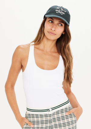 The Club Soft Cap - British Racing Green, by The Upside Save face in our The Club Soft Cap.  Soft retro fit cap in British Racing Green Golf club embroidered logo at front in white Adjustable velcro strap at back Organic cotton twill fabric