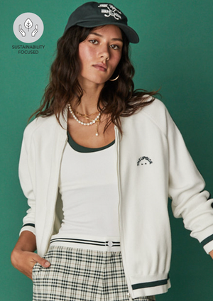 St Germain Jordana Jacket - White, by The Upside Channel French girl energy with the breton stripes of our St Germain Jordana Jacket.  Organic cotton mid-weight knit Zip through longer line bomber jacket Contrast knitted stripes and cuff Embroidered horseshoe logo at front