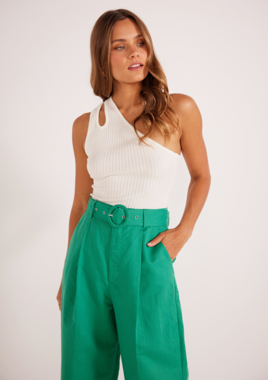 Ella One Shoulder Knit Top - White, by MinkPink The Ella One Shoulder Top features a stretch rib knit fabrication, and a fitted silhouette. This piece will become your go-to pairing piece for seasons to come.  - Tear drop cut out feature at the front & back  - One shoulder design  - Full length garment  - Fitted silhouette