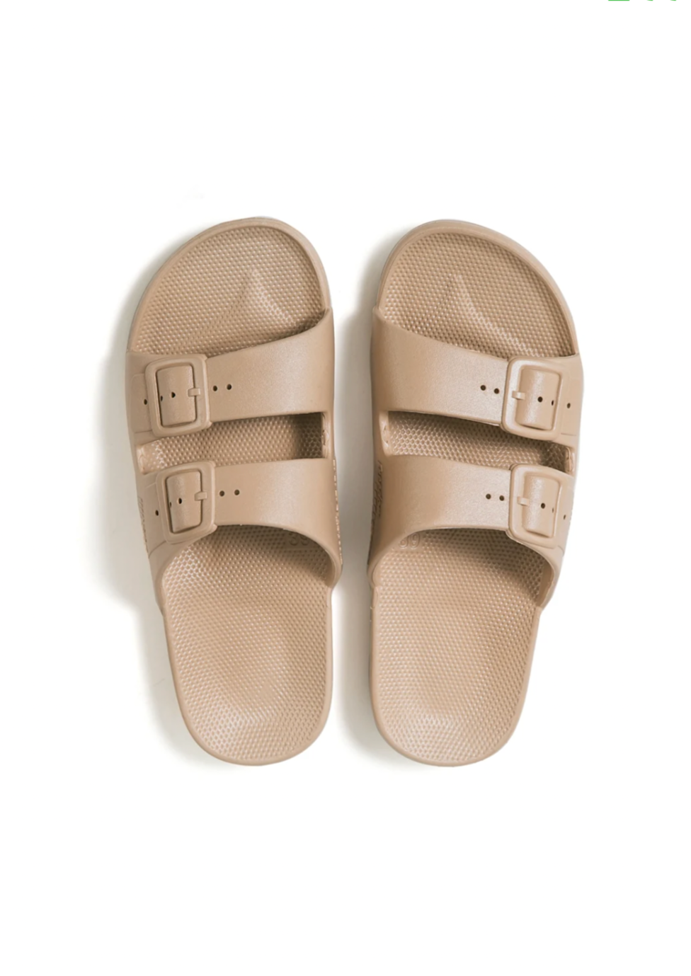 Freedom Moses 'Sands' - Desert Brown Slides We kept only the essentials, for the ultimate comfort.  Our slides are flexible, yet supportive.  Designed to feel like a hug for your feet