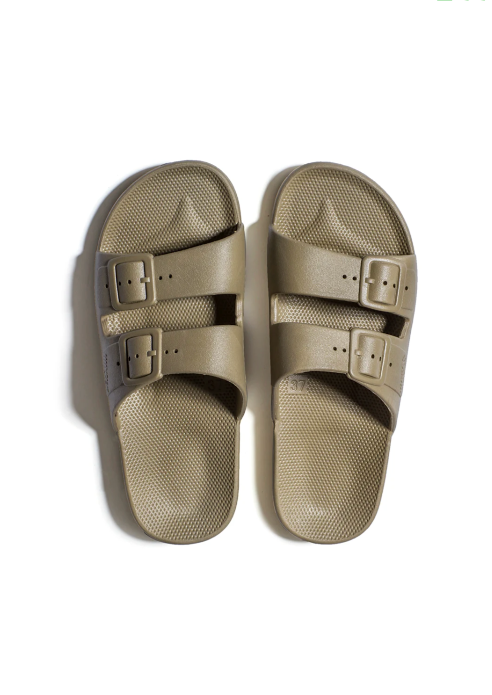 Freedom Moses 'Khaki' - Light Brown Slides We kept only the essentials, for the ultimate comfort.  Our slides are flexible, yet supportive.  Designed to feel like a hug for your feet