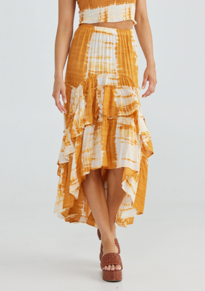 Sassy Skirt - Mustard Tie Dye, by Talisman The beloved Sassy Skirt is back in new season prints and ready to steal your heart! This flowing and feminine midi skirt will make all your boho-meets-senorita dreams come true. With layered ruffles and a full silhouette, there's no doubt she's destined for dancing!