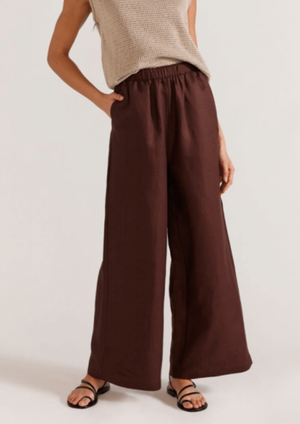 Haven Relaxed Pant - Expresso, by Staple The Label -Tencel blend wide leg fit pant -Pleating through front -Elasticated waistband - Side seam pockets - Designed in Sydney, Australia
