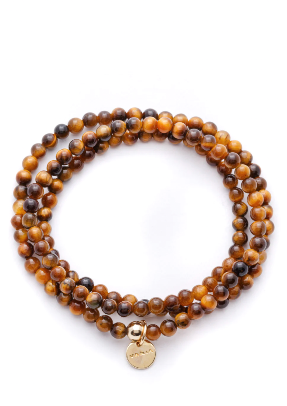 Amuleto Tiger's Eye Wrap Bracelet - Small bead Strung by hand with Tiger’s Eye and love. This gemstone is highly regarded as a stone of good luck. Throughout history, Tiger’s eye was also said to be a protective stone and was worn by Roman soldiers as an amulet. Said to be the stone that heals issues of self-worth, self-criticism and blocked creativity, by wearing this piece be reminded of your abilities and talents.