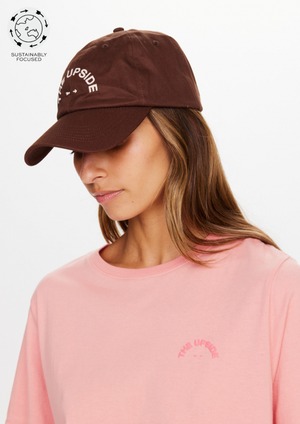 Soft Cap - Chocolate, by The Upside Protect yourself with the cruisy polish of our Soft Cap.  Soft retro fit cap 'THE UPSIDE' embroidered horseshoe logo at front Adjustable velcro strap at back Organic cotton twill fabric in chocolate