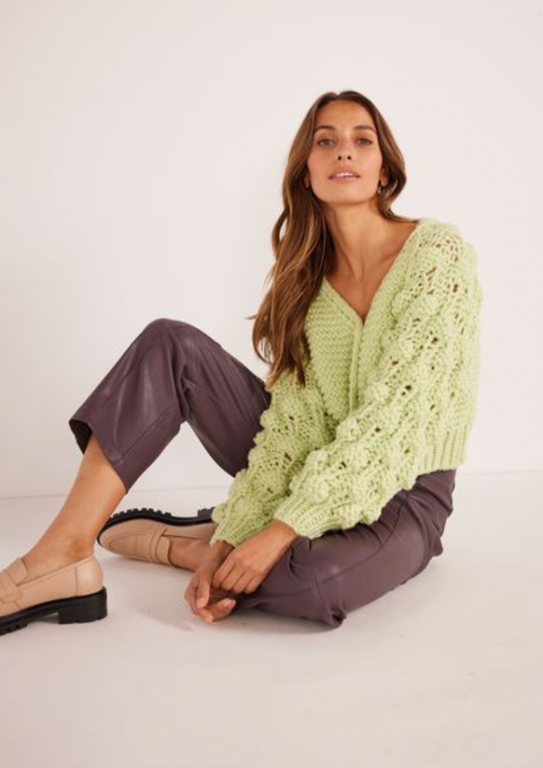 <h3>Lana Bobble Knit Cardigan - Mint, by Minkpink</h3> <p><meta charset="utf-8"><span data-mce-fragment="1">The Lana Bobble Knit Cardigan is a stand out and safe to say we don't do boring when it comes to knitwear! With exceptional texture and detailing this super cosy knit will help elevate your winter wardrobe style while also keeping you warm throughout those cooler months.</span></p>