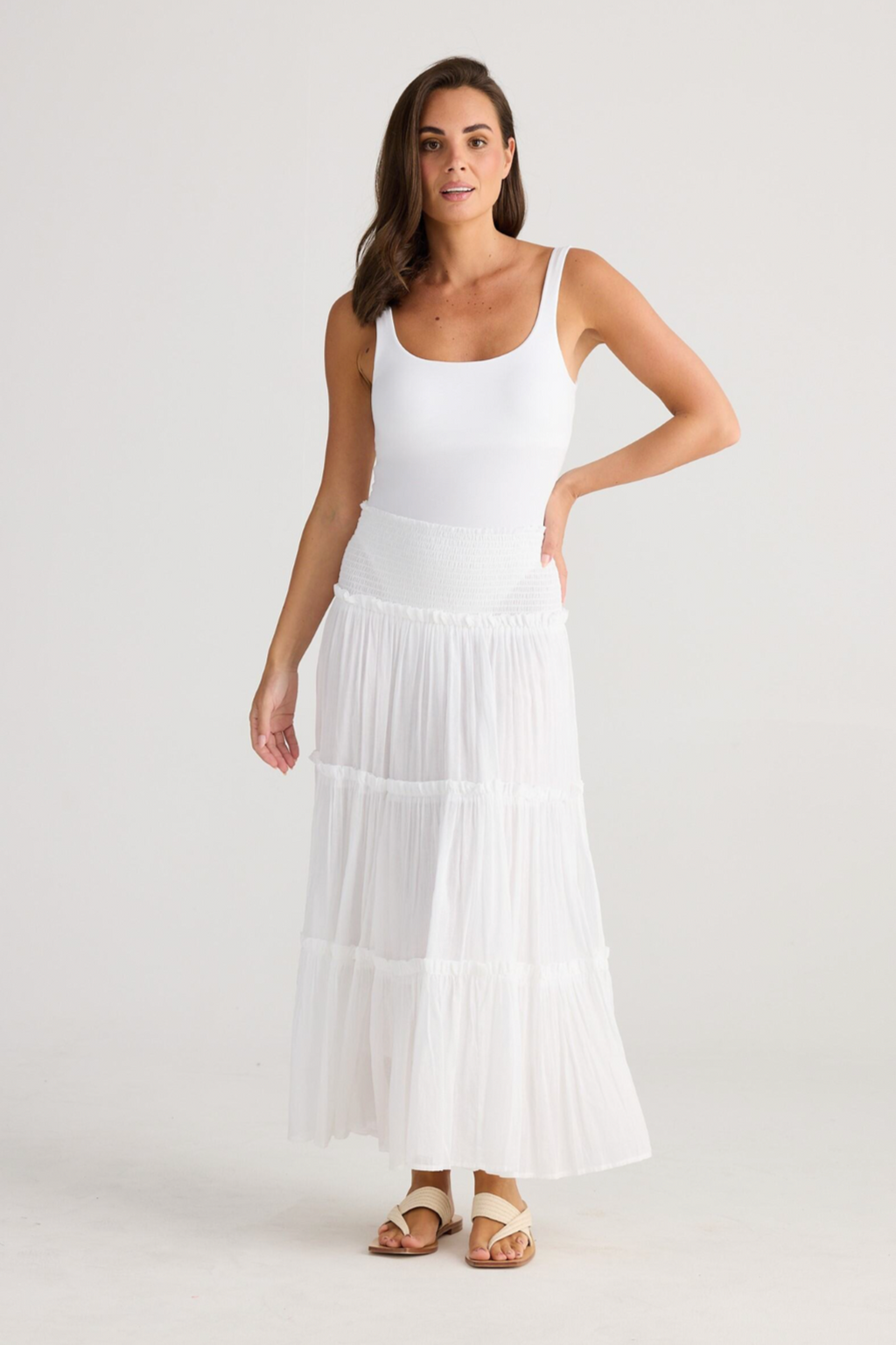 Pier Skirt - White, by Holiday  Details:  Versatile styling options - wear as a skirt or a dress!  Shirred waist panel  Tiered skirt design with ruffle trim