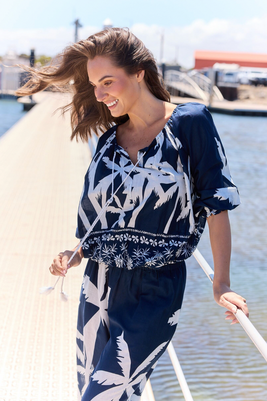 Seaside Top - Blue Haven, by Holiday  Details:  Neck ties with tassels  Full length raglan sleeves  Featured shirring on cuffs and waistband