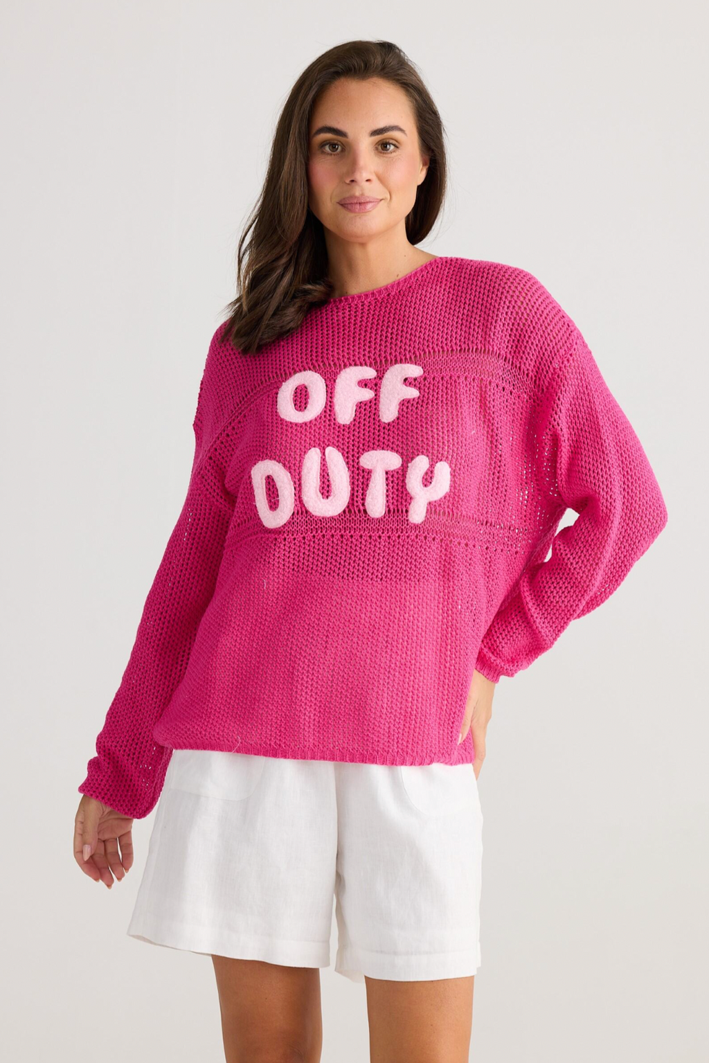 Off Duty Knit - Hot Pink, by Holiday  Details  Crochet design  Round neckline  Drop shoulder  Hip length  Featured fleece applique text "OFF DUTY"