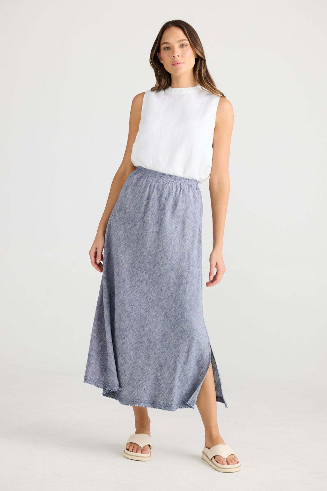 Sicily Skirt - Navy Fleck, by Shanty Corp.  Ankle length  Cut on the bias to create a beautiful drape  Elasticated waistband  Side splits  Raw edge trim