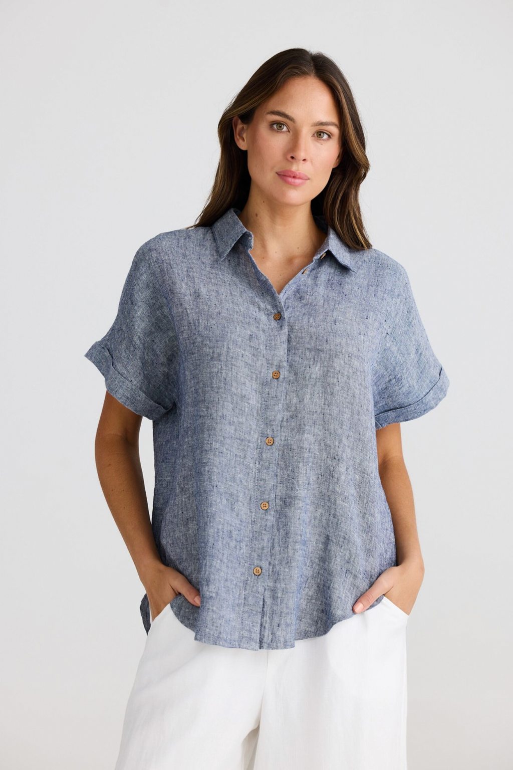 Dune Shirt - Navy Fleck, by Shanty Corp.  Classic collared style  Front closure  Relaxed fit  Short sleeve with rolled cuff