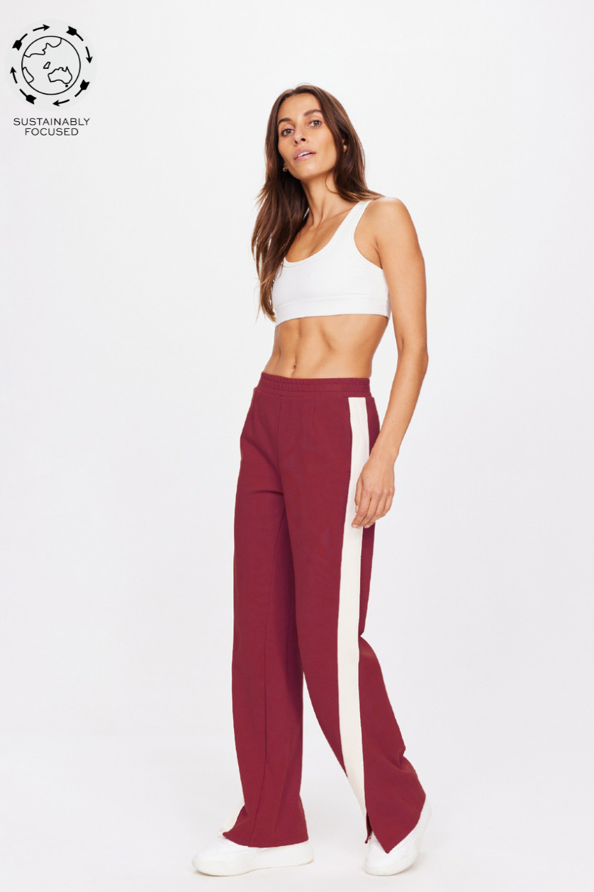 Petra Flare - Maroon, by The Upside

Everything you need in a pant, sleek sporty sophistication.

Full length soft tailored flare pant in deep maroon
Contrast cream tape down side seams
Side seam pockets
Soft elasticated waistband
Embroidered logo at back
Lenzing viscose soft suiting fabrication