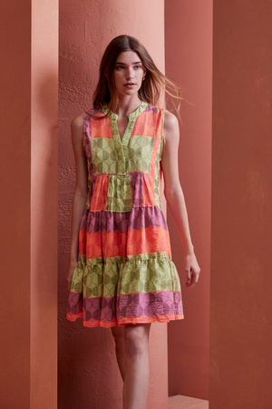 Devotion Jacinta Short Dress - M.Lime

For an effortless summer look, choose the Jacinta Short Dress from resort wear designer Devotion. The vivacious tiered dress is crafted in cotton with hand embroidered detailing. The perfect addition to your summer wardrobe.