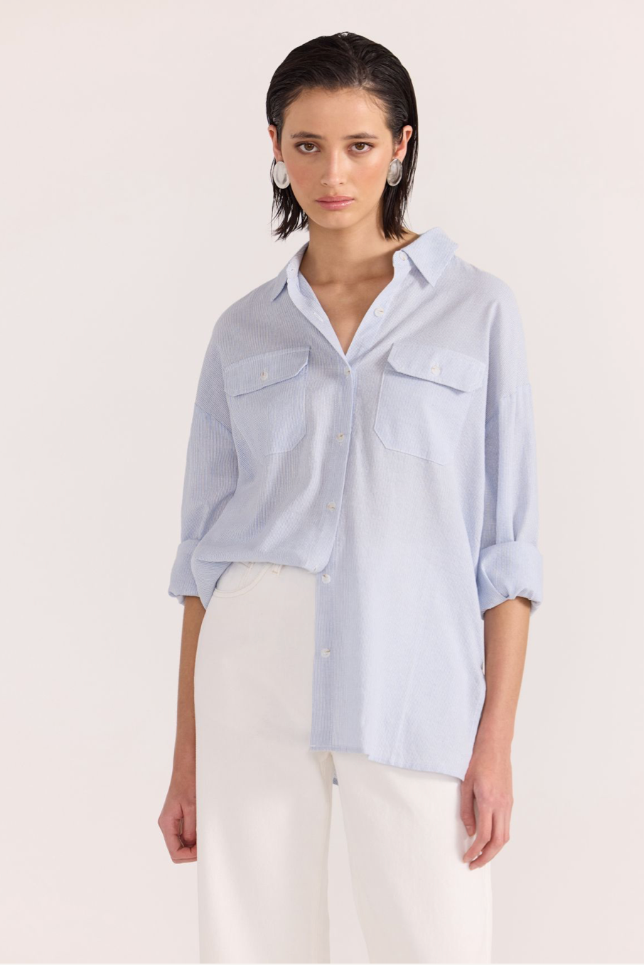 Danica Shirt - Blue/White, by Staple The Label

The Danica Shirt is a breathable &amp; lightweight garment. Perfect for the warmer seasons to come.&nbsp;

- Collared neckline
- Relaxed silhouette
- Functional buttons down the center front
- Two front patch pockets with button flap closures
- Full length sleeves