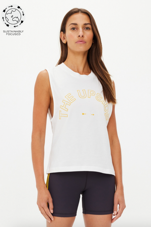 Dawson Logo Tank Top - White, by The Upside

An easy, elevated staple for everyday wear.

Mid length boxy muscle tank
100% organic cotton jersey in white
Soft ribbed neckline
Embroidered yellow horseshoe logo at front chest
Please refer to studio images for accurate colour of garment