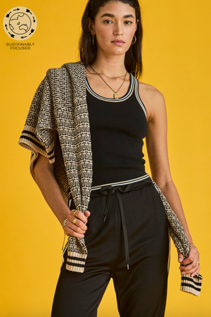 Mimi Knit Tank - Black, by The Upside

Find a new rhythm in our Mimi Knit Tank.

Organic cotton blend knitted racerback tank in black
Contrast stripes at neck, armholes and hem
Embroidered arrow at centre back
Please refer to studio images for accurate colour of garment