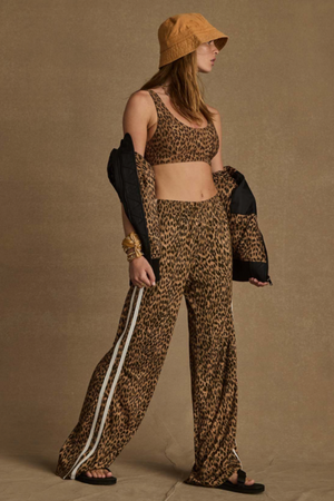 Panthera Jetset Pant - Leopard, by The Upside

Embrace your wild side with our Panthera Jetset Pant

Straight leg pant in slinky fabrication
Printed in our Panthera leopard print
Functional front and back pockets
Cream mesh binds down sides
Tonal embroidered arrow at back pocket
Please refer to studio images for accurate colour of garment