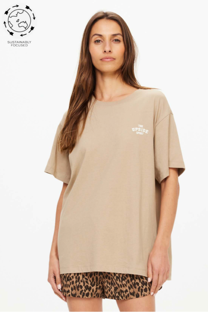 Palomino Sammi Tee - Taupe, by The Upside

A classic tee shape to throw on over any leg.

Made with 100% Organic Cotton in Taupe
Oversized tee shape with TU embroidered logo at front
Soft rib neckline
Please refer to studio images for accurate colour of garment