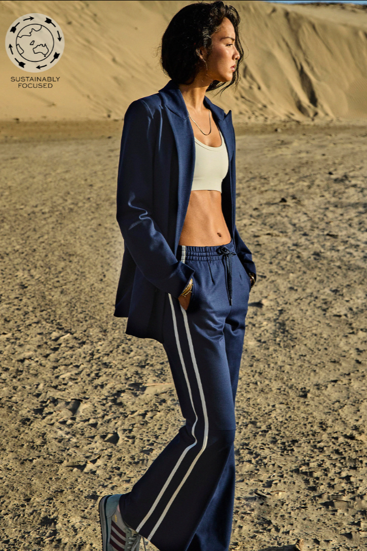 Muse Flare Pant - Navy, by The Upside

Find your grove in the Muse Flare Pant

Mid to low rise flare pant
Elasticated waist with drawcord
Contrast stripes down side seams
Side seam pockets
Embroidered arrow logo at back
Lenzing viscose soft suiting fabrication in navy