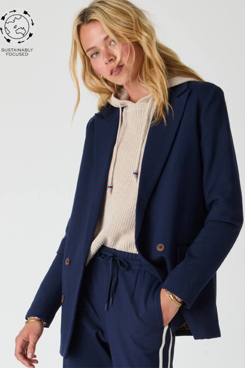 Double Breasted Blazer - Navy, by The Upside

For off-duty cool, look no further

Double breasted blazer in lenzing viscose soft suiting fabrication in navy
Flap pockets
Leopard printed lining
Branded tortoiseshell buttons