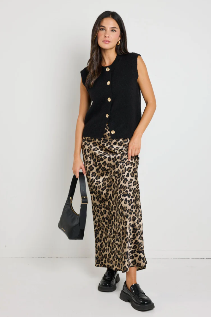 Record Bias Satin Maxi Skirt - Leopard, by Stories be Told

Walk on the wild side in the Record leopard satin maxi skirt. Its bold leopard print and silky satin fabric make a daring yet elegant statement. With a flattering waist and flowing silhouette, this skirt pairs effortlessly with cosy knits or sleek tops for versatile styling.

- Bold leopard print for a statement look
- Silky satin fabric with a luxurious, flowy feel
- Bias cut
- Elastic waist, pull on style