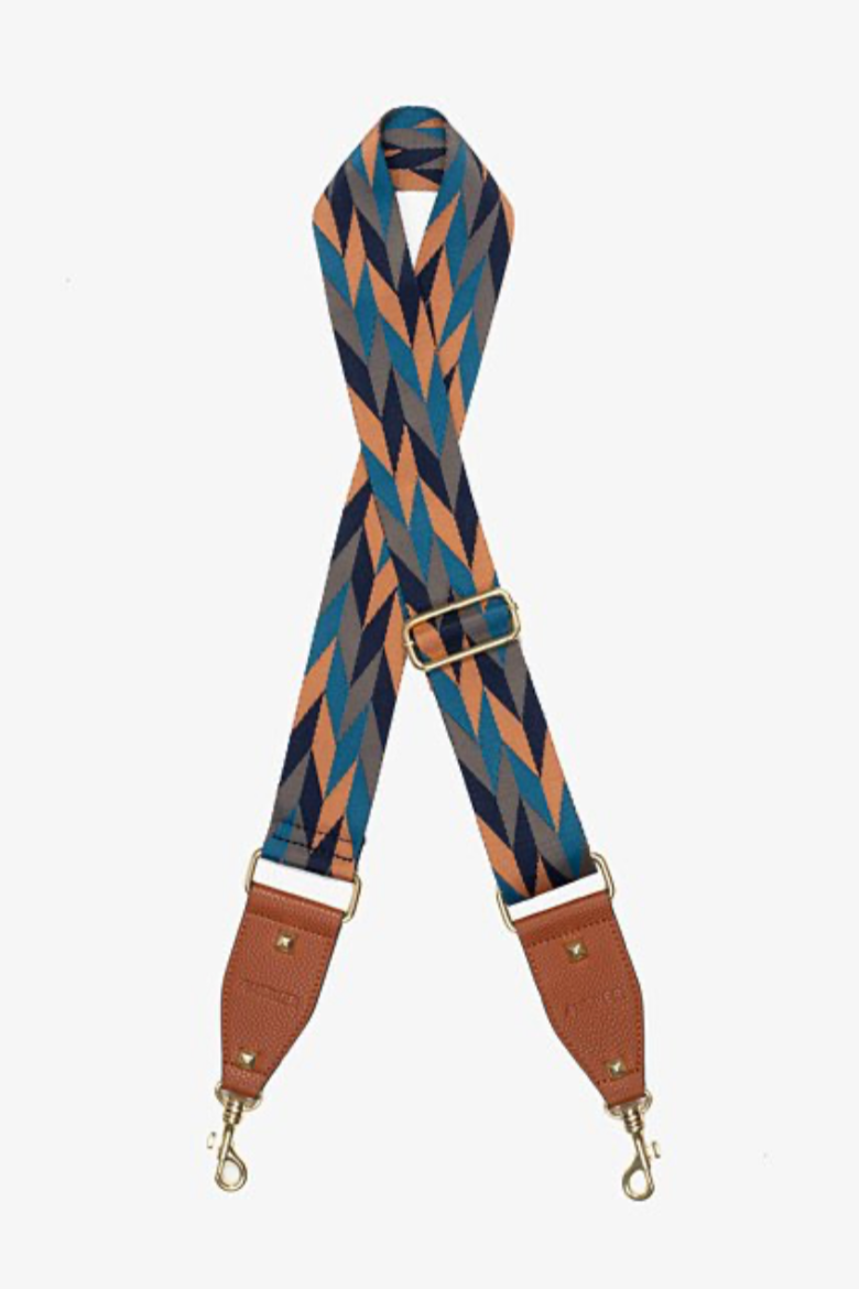 Bag Strap - Navy &amp; Caramel Chevron, by Antler

Add a striking pop of colour and pattern to your bag with the Navy &amp; Caramel Chevron Bag Strap. Featuring a bold chevron pattern in a dynamic combination of navy, caramel &amp; black this strap brings a perfect blend of colour and sophisticated contrast.